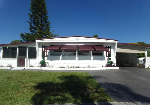 Photo 2 of Manufactured home for sale at 6385 Cypress Ln, Lake Worth, FL 33462 | MLS# B26030719 | Listing updated on 2026-09-13