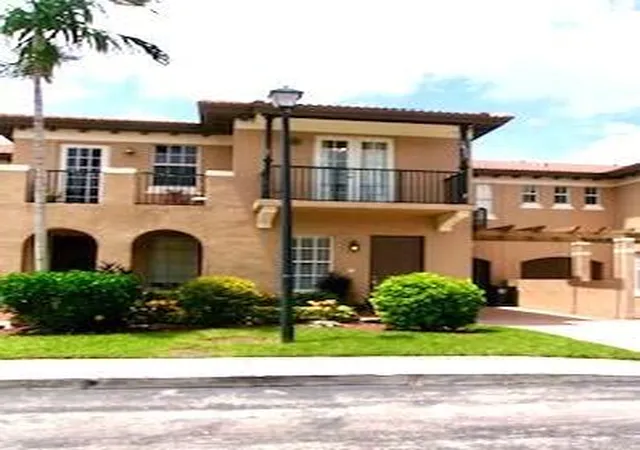 Photo 1 of Townhouse for sale at 6898 Julia Gdns Dr, Coconut Creek, FL 33073 | MLS# B26032609 | Listing updated on 2026-09-13