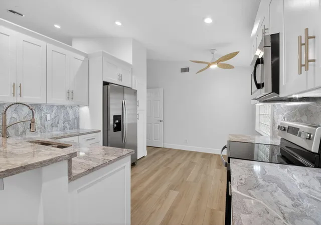 Photo 2 of Single family home for sale at 5891 Royal Isles Blvd, Boynton Beach, FL 33437 | MLS# B26034803 | Listing updated on 2026-09-14