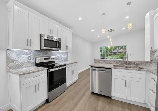 Photo 4 of Single family home for sale at 5891 Royal Isles Blvd, Boynton Beach, FL 33437 | MLS# B26034803 | Listing updated on 2026-09-14