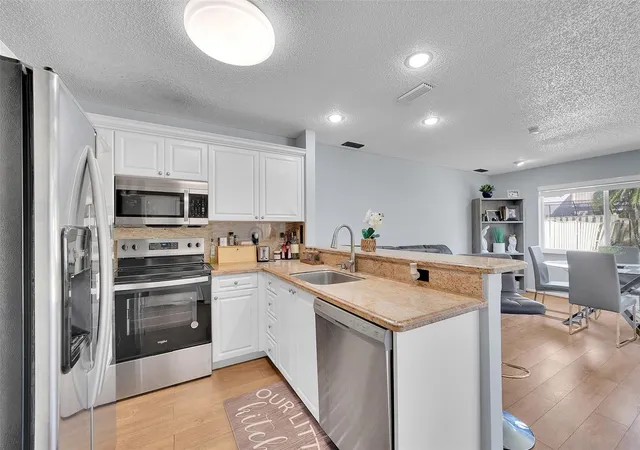 Photo 3 of Single family home for sale at 10615 NW 12th Court, Plantation, FL 33322 | MLS# B26035253 | Listing updated on 2026-09-23
