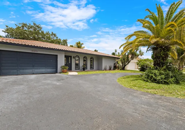 Photo 2 of Single family home for sale at 10875 Nw 40th Street, Coral Springs, FL 33065 | MLS# B26037676 | Listing updated on 2026-09-23