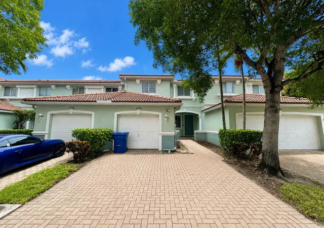 Photo 2 of Townhouse for sale at 2228 Oakmont Dr, Riviera Beach, FL 33404 | MLS# B26038113 | Listing updated on 2026-09-14