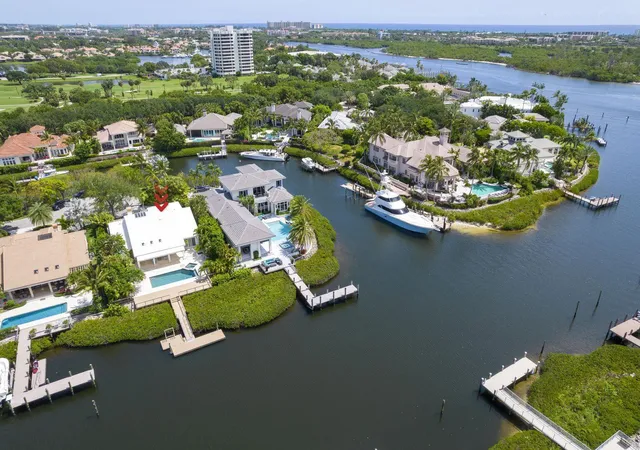 Photo 2 of Single family home for sale at 215 Island Dr, Jupiter, FL 33477 | MLS# B26038610 | Listing updated on 2026-09-16