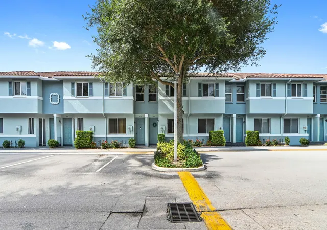 Photo 1 of Townhouse for sale at 1941 Gardenia Ct, Riviera Beach, FL 33404 | MLS# B26045838 | Listing updated on 2026-09-25