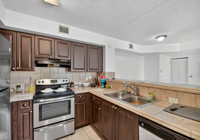 Photo 3 of Condo for sale at 1733 Village Blvd #105, West Palm Beach, FL 33409 | MLS# B26047471 | Listing updated on 2026-10-07
