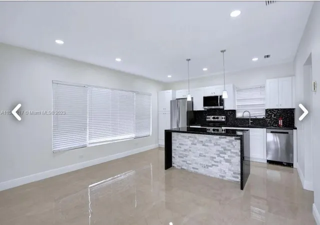 Photo 2 of Multi family home for sale at 6720 Coolidge St, Hollywood, FL 33024 | MLS# B26048664 | Listing updated on 2026-09-30