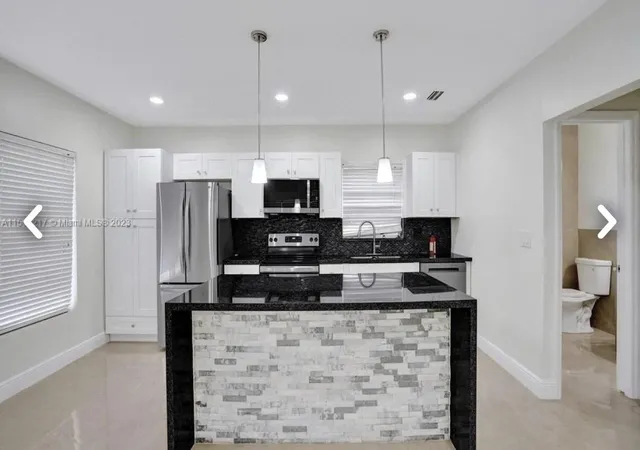 Photo 3 of Multi family home for sale at 6720 Coolidge St, Hollywood, FL 33024 | MLS# B26048664 | Listing updated on 2026-09-30
