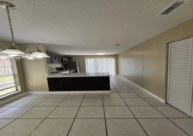 Photo 3 of Townhouse for sale at 4876 Orleans Ct #A, West Palm Beach, FL 33415 | MLS# B26048669 | Listing updated on 2026-09-15
