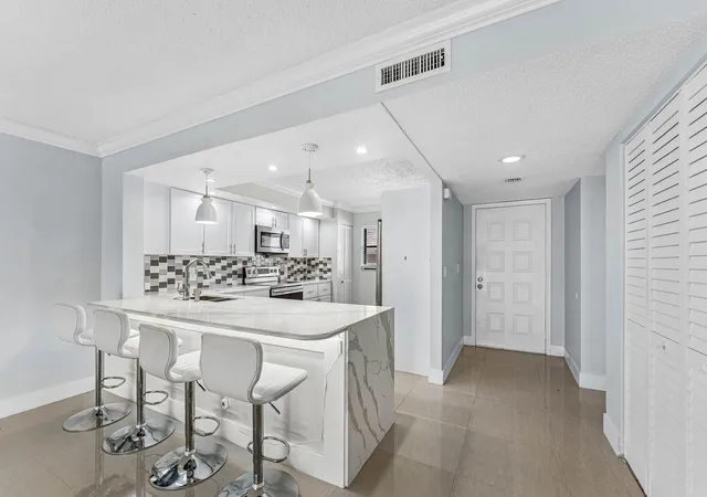 Photo 3 of Condo for sale at 12926 Briarlake Dr #201, Palm Beach Gardens, FL 33418 | MLS# B26049661 | Listing updated on 2026-09-14