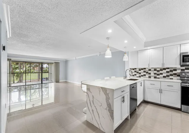 Photo 4 of Condo for sale at 12926 Briarlake Dr #201, Palm Beach Gardens, FL 33418 | MLS# B26049661 | Listing updated on 2026-09-14