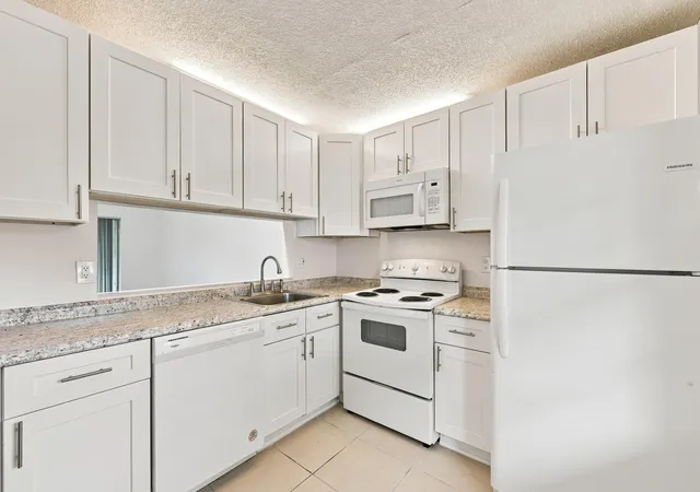 Photo 2 of Condo for sale at 8820 Royal Palm Blvd #101-4, Coral Springs, FL 33065 | MLS# B26049719 | Listing updated on 2026-09-13