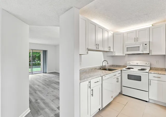 Photo 3 of Condo for sale at 8820 Royal Palm Blvd #101-4, Coral Springs, FL 33065 | MLS# B26049719 | Listing updated on 2026-09-13