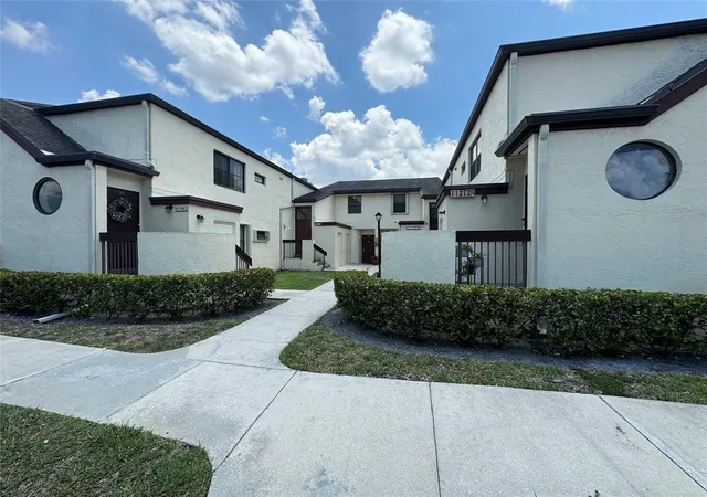 Photo 1 of Condo for sale at 11318 Taft St, Pembroke Pines, FL 33026 | MLS# B26050064 | Listing updated on 2026-09-16