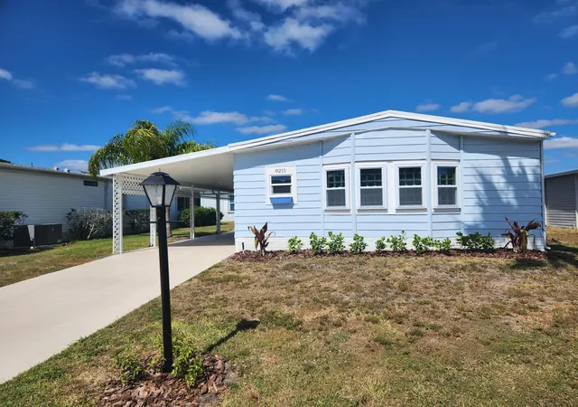 Photo 1 of Manufactured home for sale at 8215 Caper Ln, Port St Lucie, FL 34952 | MLS# B26050179 | Listing updated on 2026-09-14