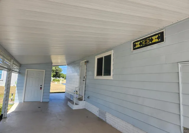 Photo 2 of Manufactured home for sale at 8215 Caper Ln, Port St Lucie, FL 34952 | MLS# B26050179 | Listing updated on 2026-09-14