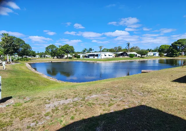 Photo 3 of Manufactured home for sale at 8215 Caper Ln, Port St Lucie, FL 34952 | MLS# B26050179 | Listing updated on 2026-09-14