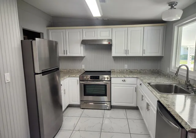 Photo 4 of Manufactured home for sale at 8215 Caper Ln, Port St Lucie, FL 34952 | MLS# B26050179 | Listing updated on 2026-09-14
