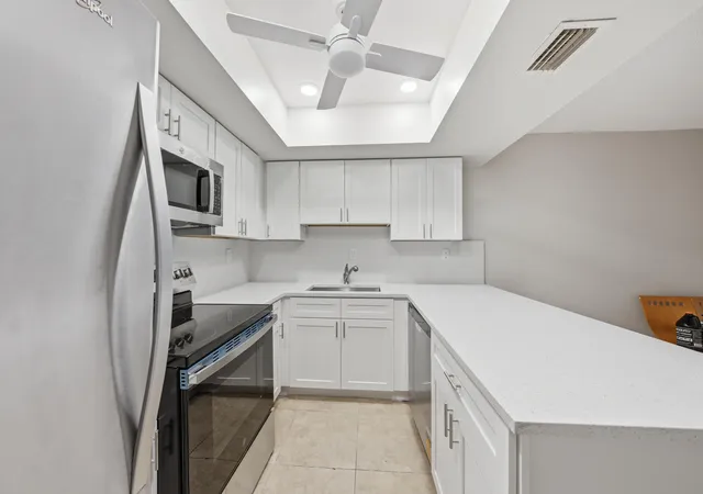Photo 1 of Condo for sale at 52 Canterbury Ln, Tamarac, FL 33319 | MLS# B26051147 | Listing updated on 2026-10-02