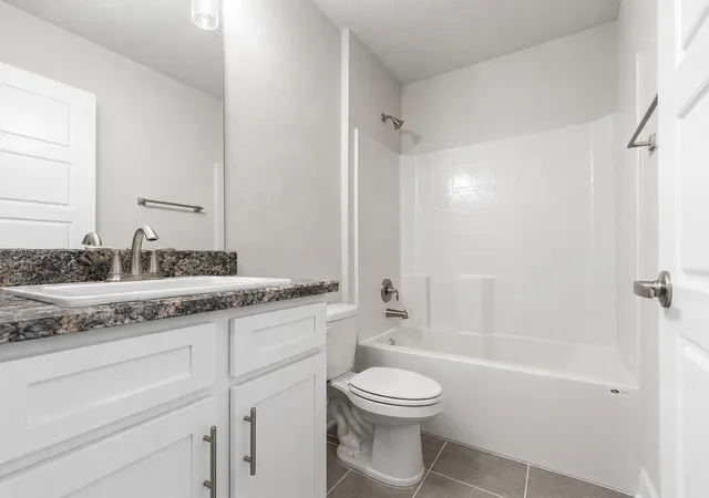 Photo 4 of Single family home for sale at 405 NE Airoso Blvd, Port Saint Lucie, FL 34983 | MLS# B26052229 | Listing updated on 2026-09-14