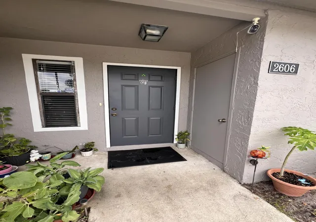 Photo 2 of Townhouse for sale at 2606 Canalside Dr, Greenacres, FL 33463 | MLS# B26054948 | Listing updated on 2026-09-14