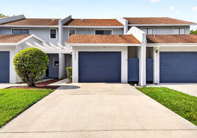 Townhouse for sale at 1633 Woodbridge Lakes Cir #1633, West Palm Beach, FL 33406 | MLS# B26057279