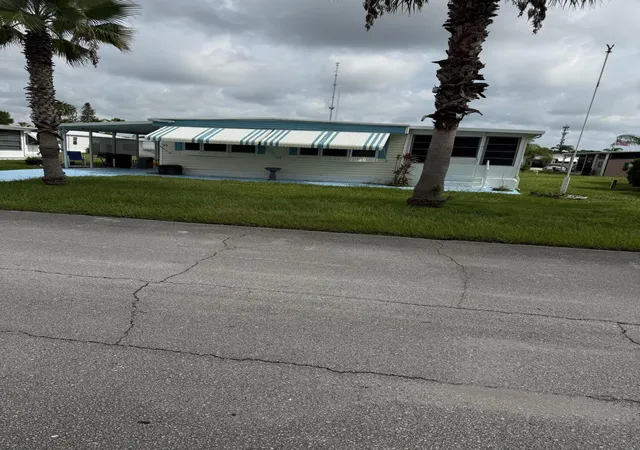 Photo 2 of Manufactured home for sale at 29 Golf Dr, Port Saint Lucie, FL 34952 | MLS# B26057446 | Listing updated on 2026-09-14