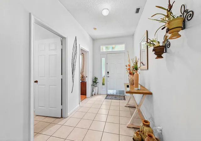 Photo 3 of Single family home for sale at 1308 Fishers Pl, Greenacres, FL 33413 | MLS# B26058635 | Listing updated on 2026-10-01