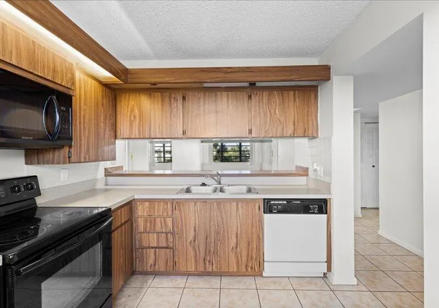 Listing Photo 5 - Condo for sale in building located at 3501 Vlg Blvd, West Palm Beach, FL 33409 - Unit #406