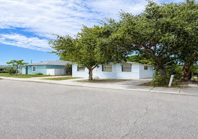 Photo 3 of Single family home for sale at 1410 S J St, Lake Worth Beach, FL 33460 | MLS# B26060876 | Listing updated on 2026-10-06