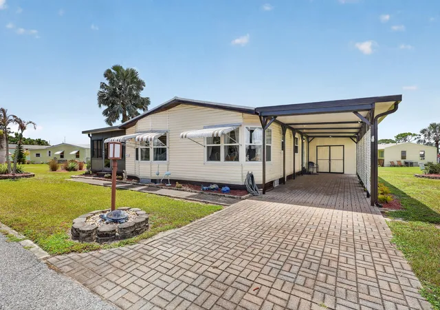 Photo 2 of Manufactured home for sale at 471 Ann Marie Cir, Port Saint Lucie, FL 34952 | MLS# B26061924 | Listing updated on 2026-09-14