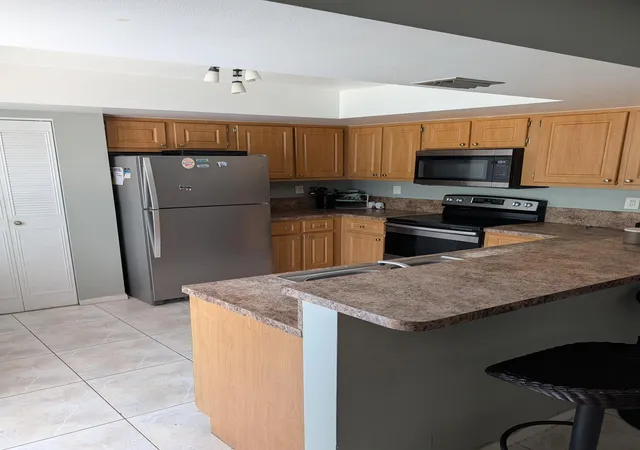 Photo 3 of Townhouse for sale at 12055 Basin St N, Wellington, FL 33414 | MLS# B26062286 | Listing updated on 2026-10-05