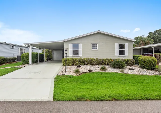 Photo 2 of Manufactured home for sale at 7928 Meadowlark Ln, Port Saint Lucie, FL 34952 | MLS# B26062331 | Listing updated on 2026-09-14