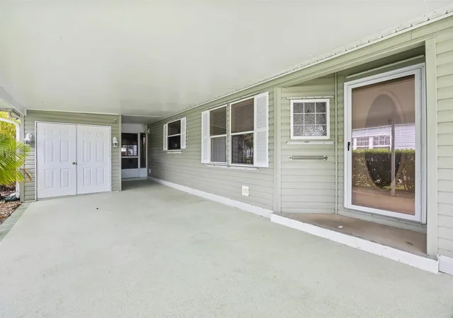 Photo 3 of Manufactured home for sale at 7928 Meadowlark Ln, Port Saint Lucie, FL 34952 | MLS# B26062331 | Listing updated on 2026-09-14