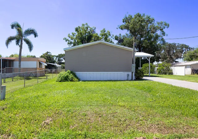 Photo 3 of Manufactured home for sale at 2208 Se 38th Trail, Okeechobee, FL 34974 | MLS# B26063505 | Listing updated on 2026-10-06
