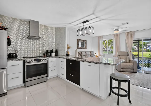 Photo 3 of Townhouse for sale at 2260 Discovery Cir W, Deerfield Beach, FL 33442 | MLS# B26063878 | Listing updated on 2026-09-23