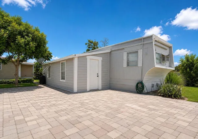 Photo 1 of Manufactured home for sale at 11411 Se Federal Hwy #55, Hobe Sound, FL 33455 | MLS# B26064009 | Listing updated on 2026-09-15