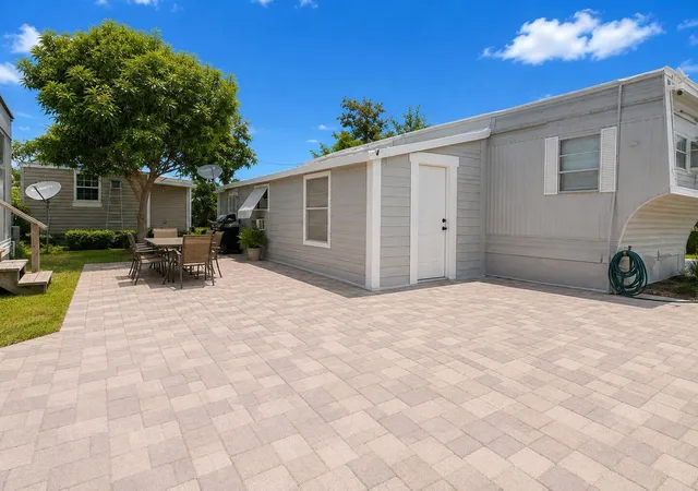 Photo 2 of Manufactured home for sale at 11411 Se Federal Hwy #55, Hobe Sound, FL 33455 | MLS# B26064009 | Listing updated on 2026-09-15