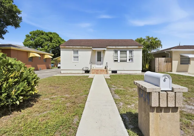 Photo 1 of Single family home for sale at 1214 N C St, Lake Worth Beach, FL 33460 | MLS# B26065763 | Listing updated on 2026-09-15
