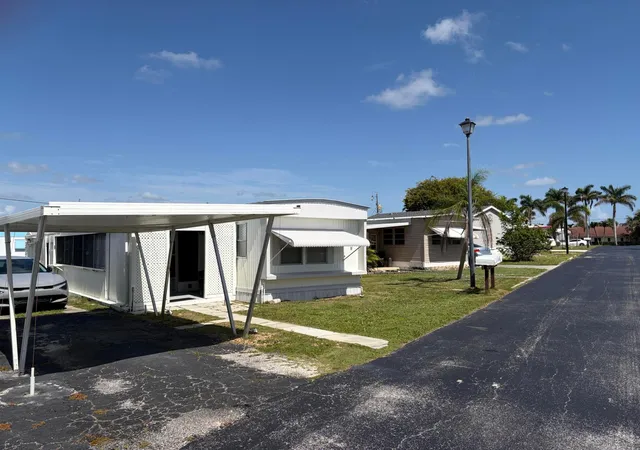 Photo 2 of Manufactured home for sale at 11055 Se Federal Hwy #19, Hobe Sound, FL 33455 | MLS# B26065784 | Listing updated on 2026-09-23