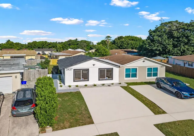 Single family home for sale at 5937 Caribbean Blvd, West Palm Beach, FL 33407 | MLS# B26065944