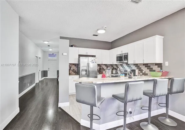 Photo 3 of Sale Pending at 4824 NW 19th Street, Coconut Creek, FL 33063 | MLS# B26066297 | Listing updated on 2026-09-13