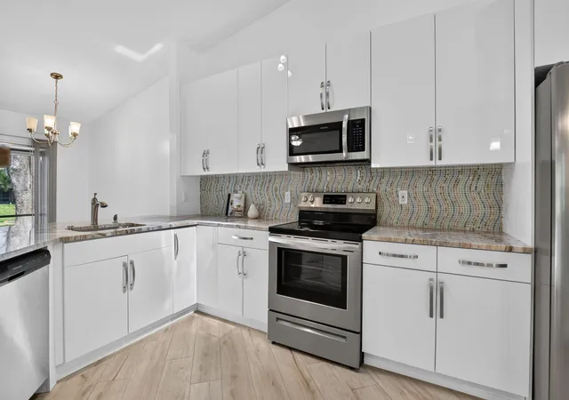 Photo 1 of Single family home for sale at 1971 Discovery Cir E, Deerfield Beach, FL 33442 | MLS# B26067406 | Listing updated on 2026-09-13