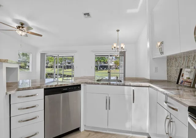 Photo 2 of Single family home for sale at 1971 Discovery Cir E, Deerfield Beach, FL 33442 | MLS# B26067406 | Listing updated on 2026-09-13