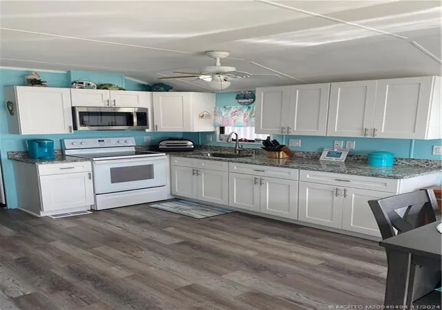 Photo 3 of Manufactured home for sale at 664 Nettles Blvd, Jensen Beach, FL 34957 | MLS# B26067524 | Listing updated on 2026-10-04