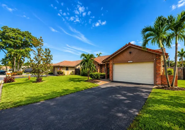 Photo 1 of Single family home for sale at 10666 Nw 2nd Pl, Coral Springs, FL 33071 | MLS# B26068318 | Listing updated on 2026-09-14
