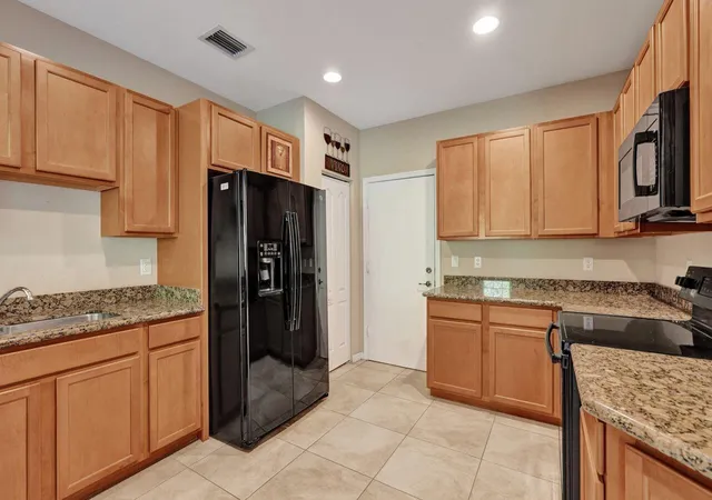 Photo 3 of Townhouse for sale at 4603 Cohune Palm Ct, Greenacres, FL 33463 | MLS# B26068495 | Listing updated on 2026-10-06