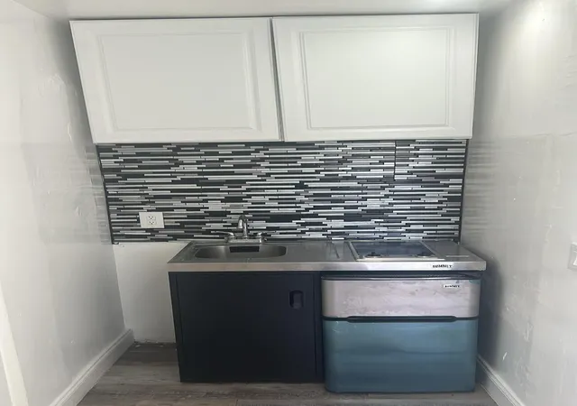 Photo 3 of Multi family home for sale at 810 Nw 40th #1-3, Oakland Park, FL 33309 | MLS# B26068652 | Listing updated on 2026-09-23