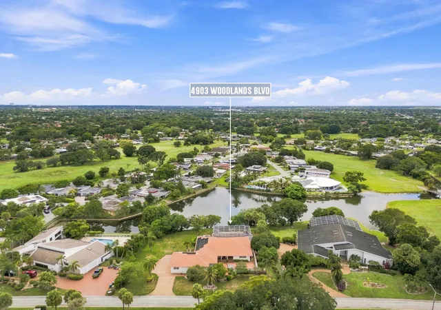 Photo 1 of Single family home for sale at 4903 Woodlands Blvd, Tamarac, FL 33319 | MLS# B26069014 | Listing updated on 2026-09-14