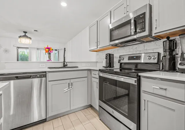 Photo 3 of Townhouse for sale at 5031 Genove Pl, Riviera Beach, FL 33410 | MLS# B26069305 | Listing updated on 2026-09-23